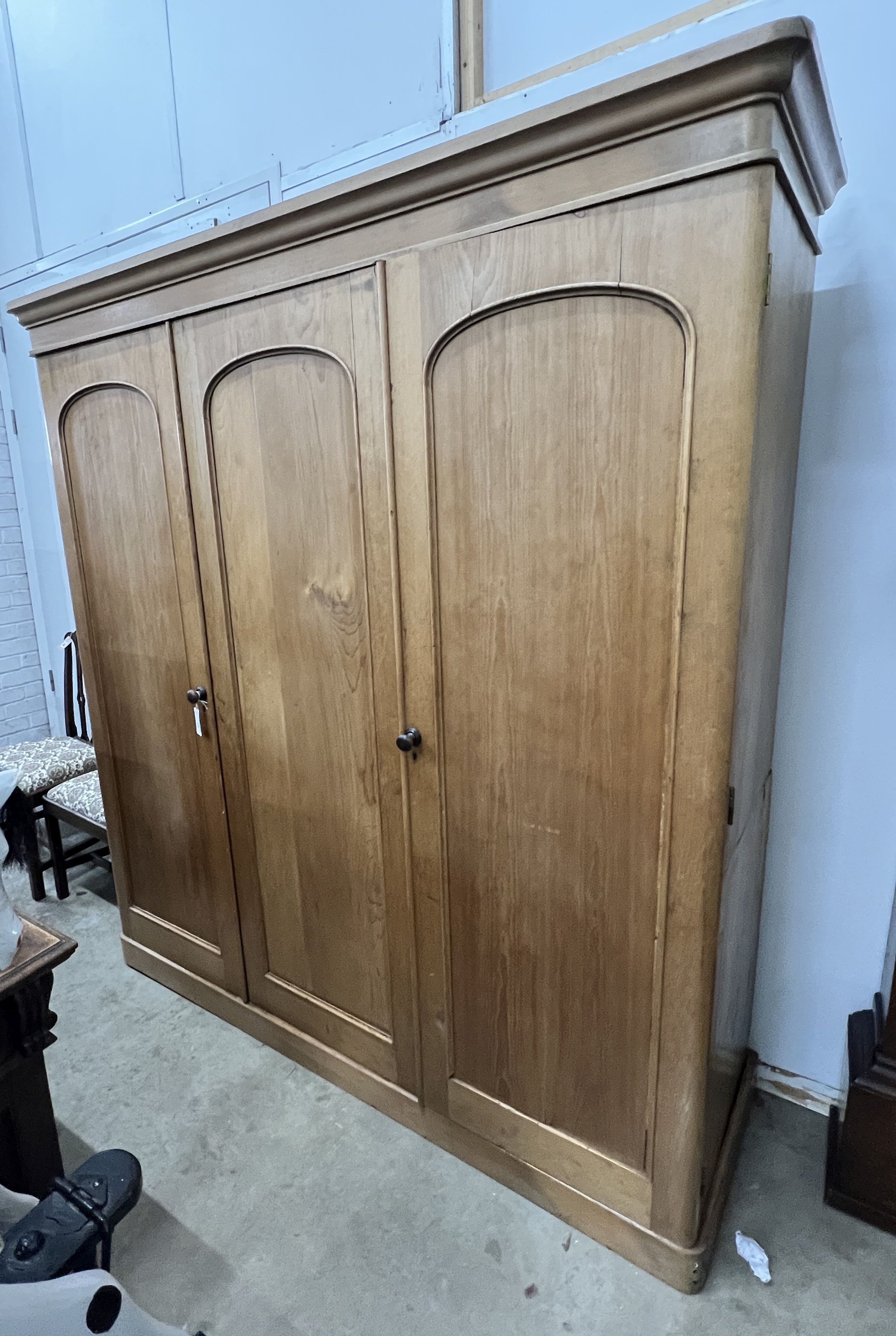 A Victorian pine compactum triple wardrobe, width 188cm, depth 60cm, height 205cm